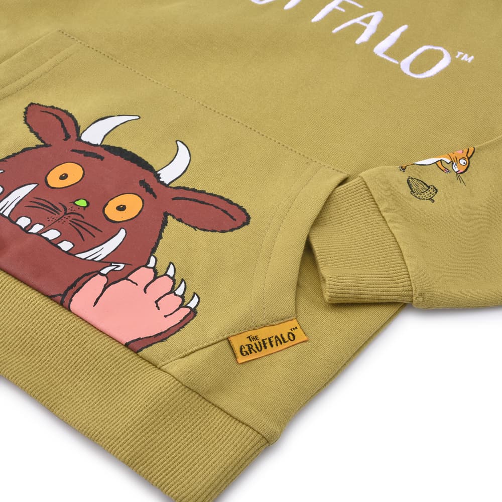Close view of the same Gruffalo hoodie showing its printed characters, ribbed cuff and woven label