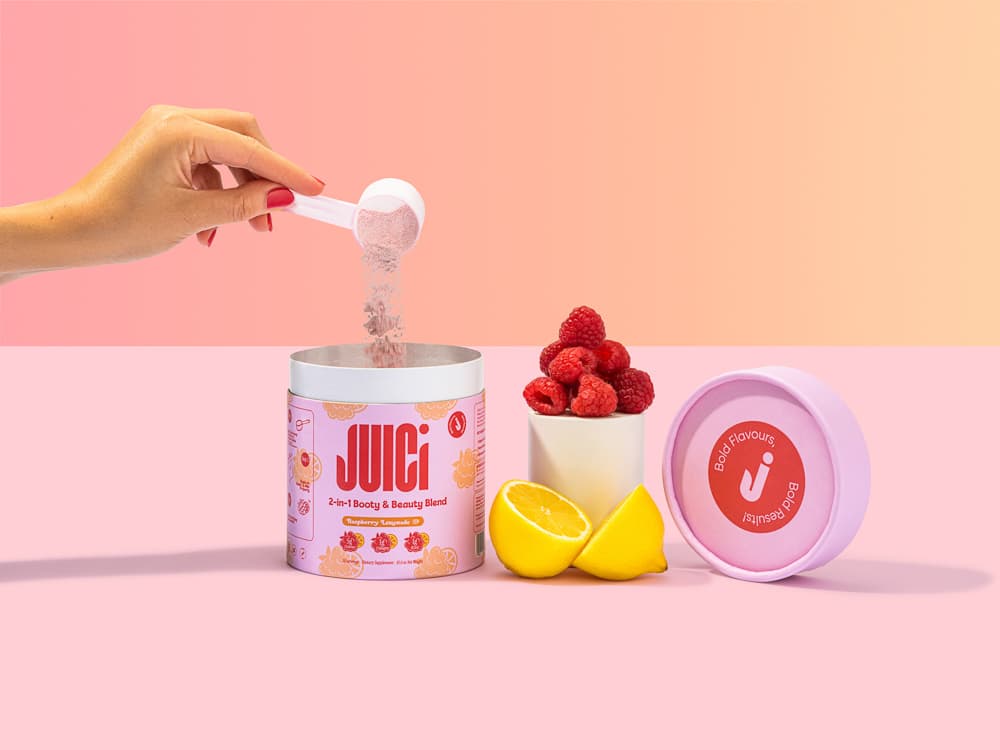 Lifestyle product photography - styled raspberry lemonade drink in context, UK product photography studio