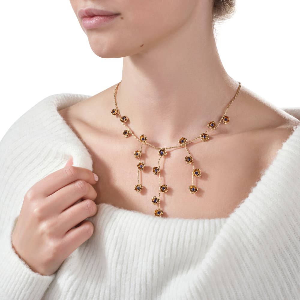 Red Preciosa necklace on model - bold jewellery lifestyle photography UK