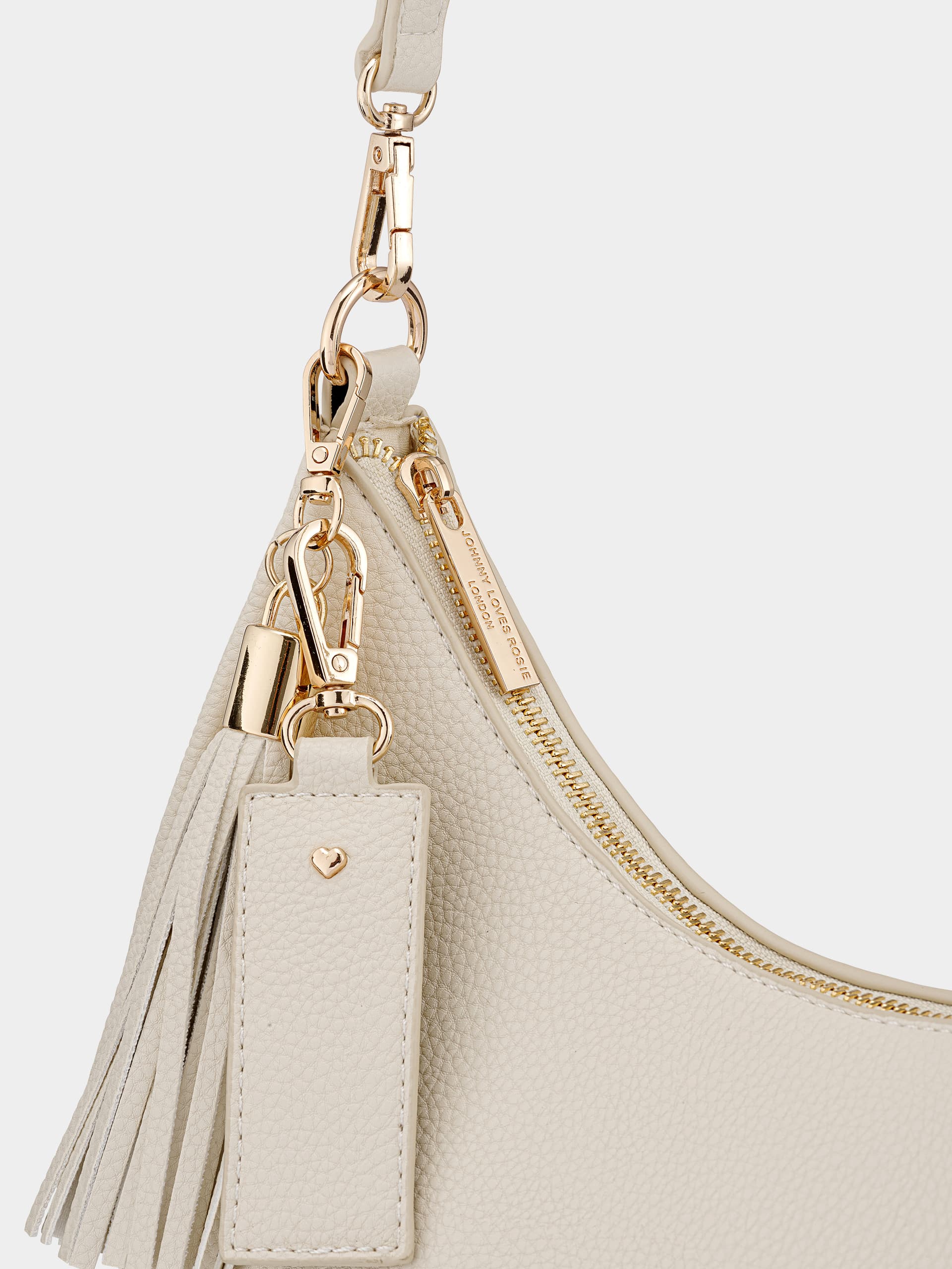 Close-up product photography of a bag showing stitching, hardware and surface texture