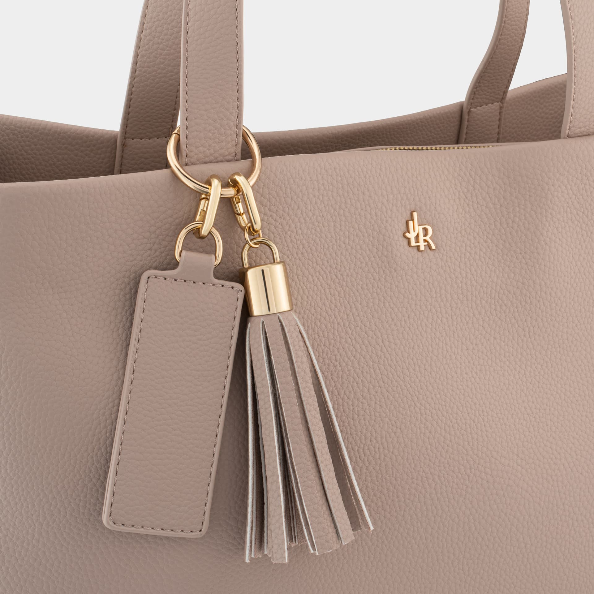 Bag materials and detail photography - leather grain, stitching and hardware UK