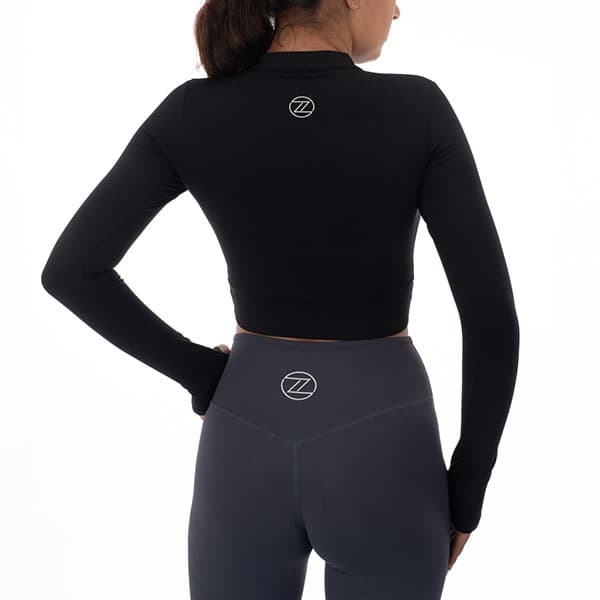 On-model clothing photography showing fit and styling of a printed dress