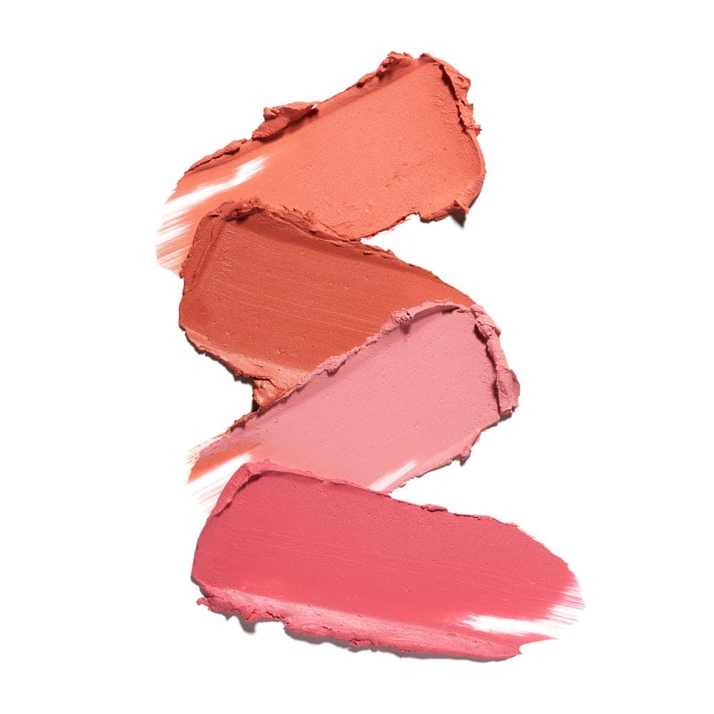 Product range of beauty items photographed consistently with matching lighting, background and styling