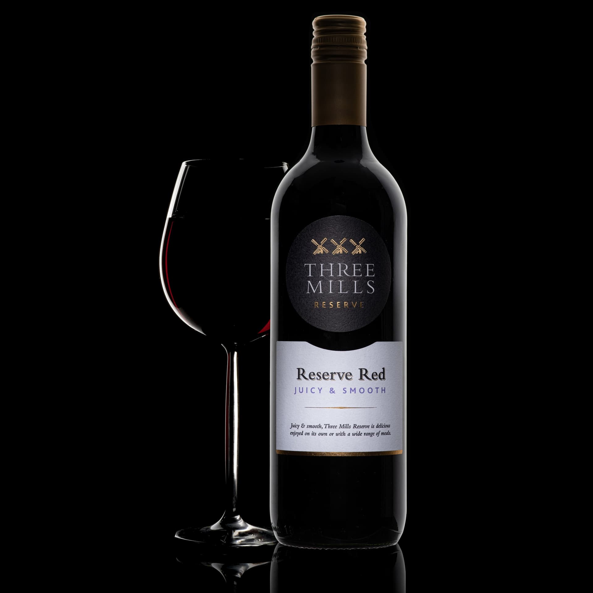 Red Wine Moody Studio Red wine bottle and glass dark moody studio lighting - bottle photography UK