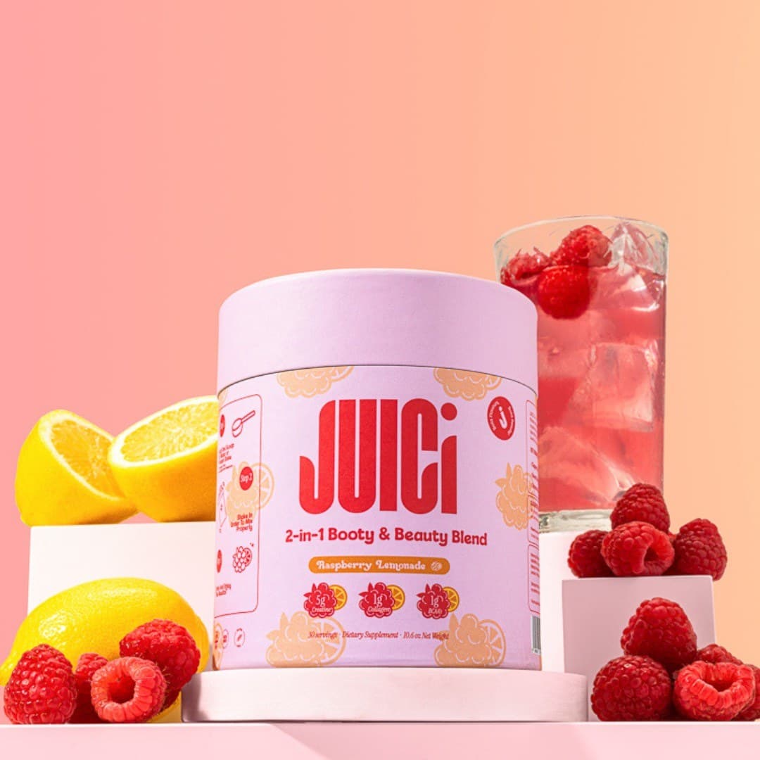 Raspberry Lemonade Supplement Supplement powder raspberry lemonade creative shot on pink background - health & wellness product photography UK