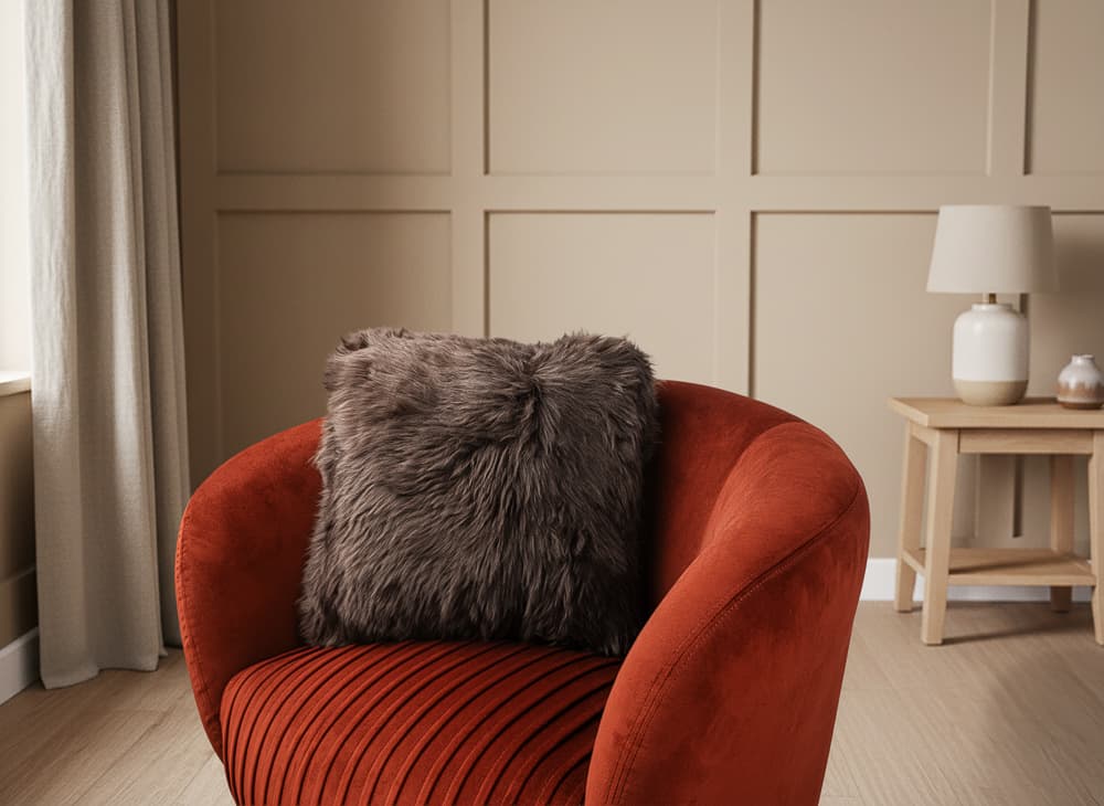 Dark brown cushion in styled room digital composite - room setting photography UK